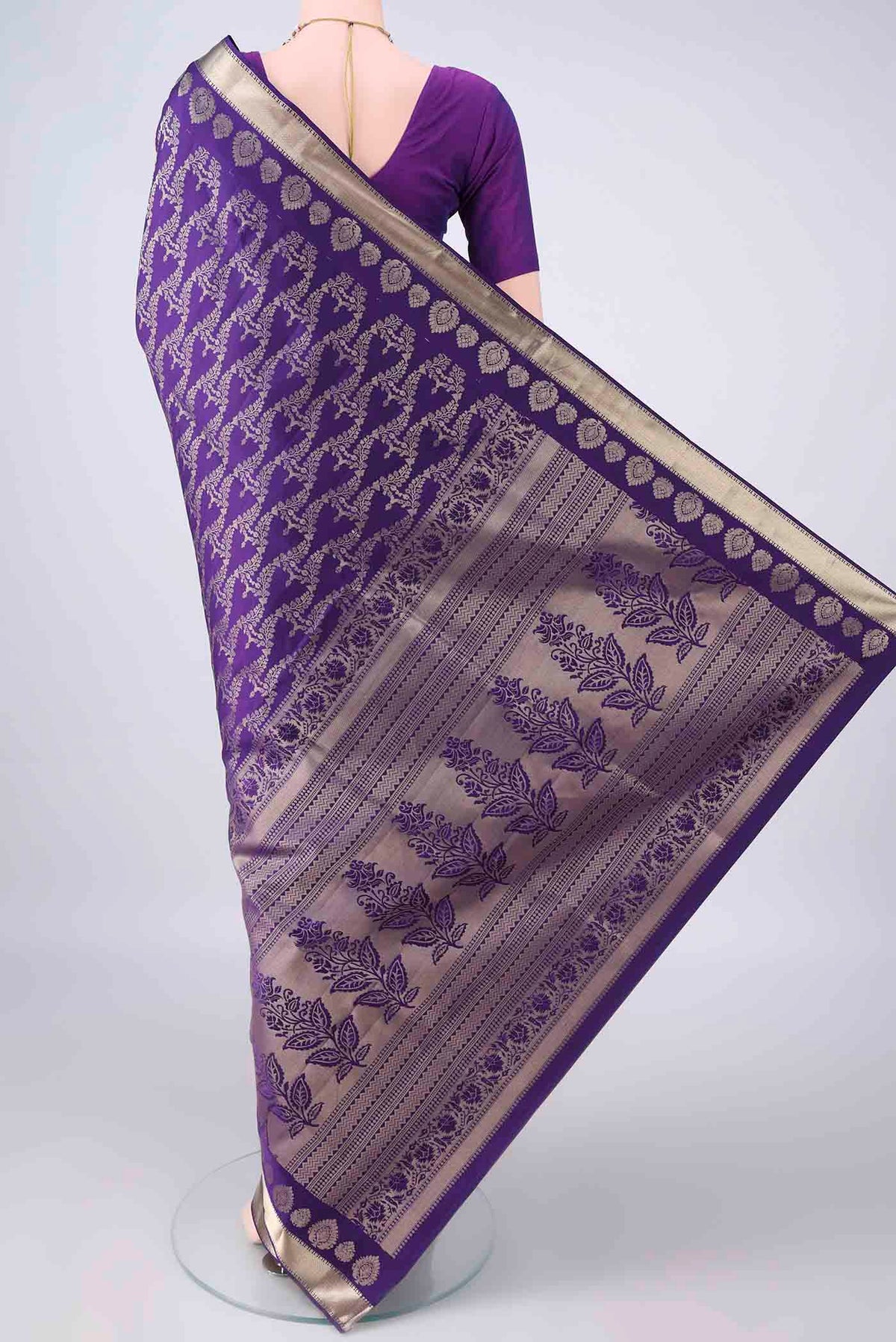 Flat view of Pure Silk Violet Soft Saree with Zari Brocade on the body and Zari Border. 