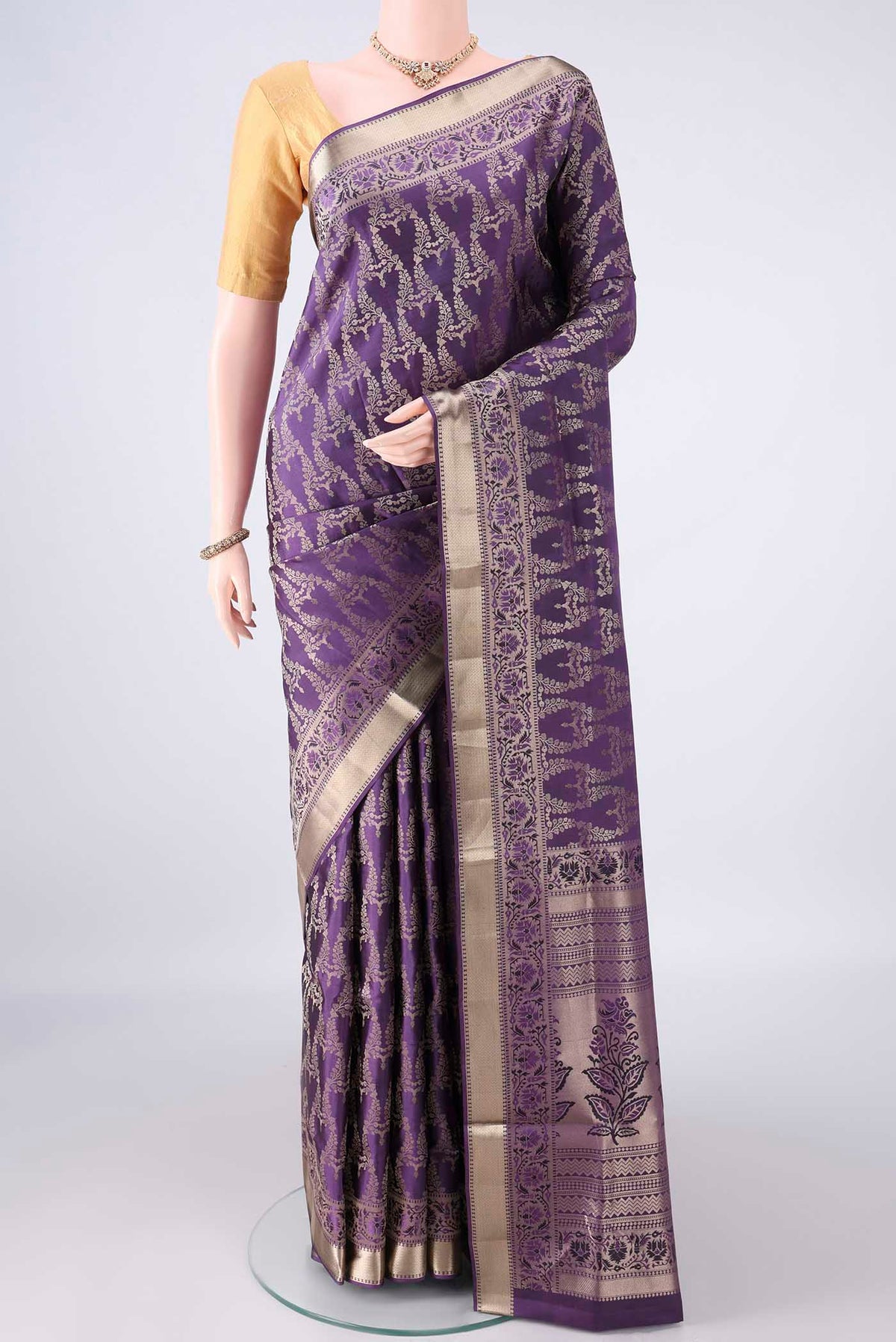 Pure Silk Violet Soft Saree with Zari Brocade on the body and Zari Border.  displayed on a mannequin