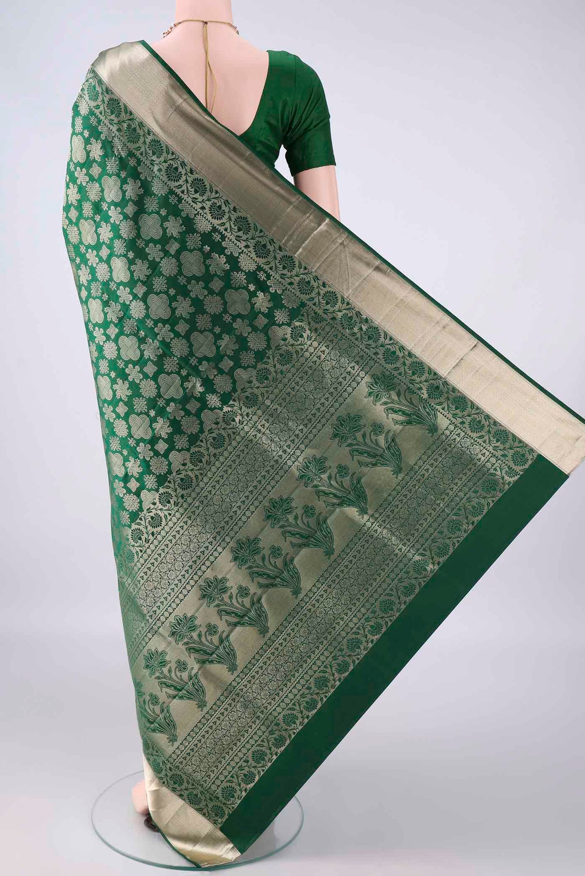 Flat view of Pure Silk Bottle Green Soft Saree with Zari Brocade on the body and Zari Border. 