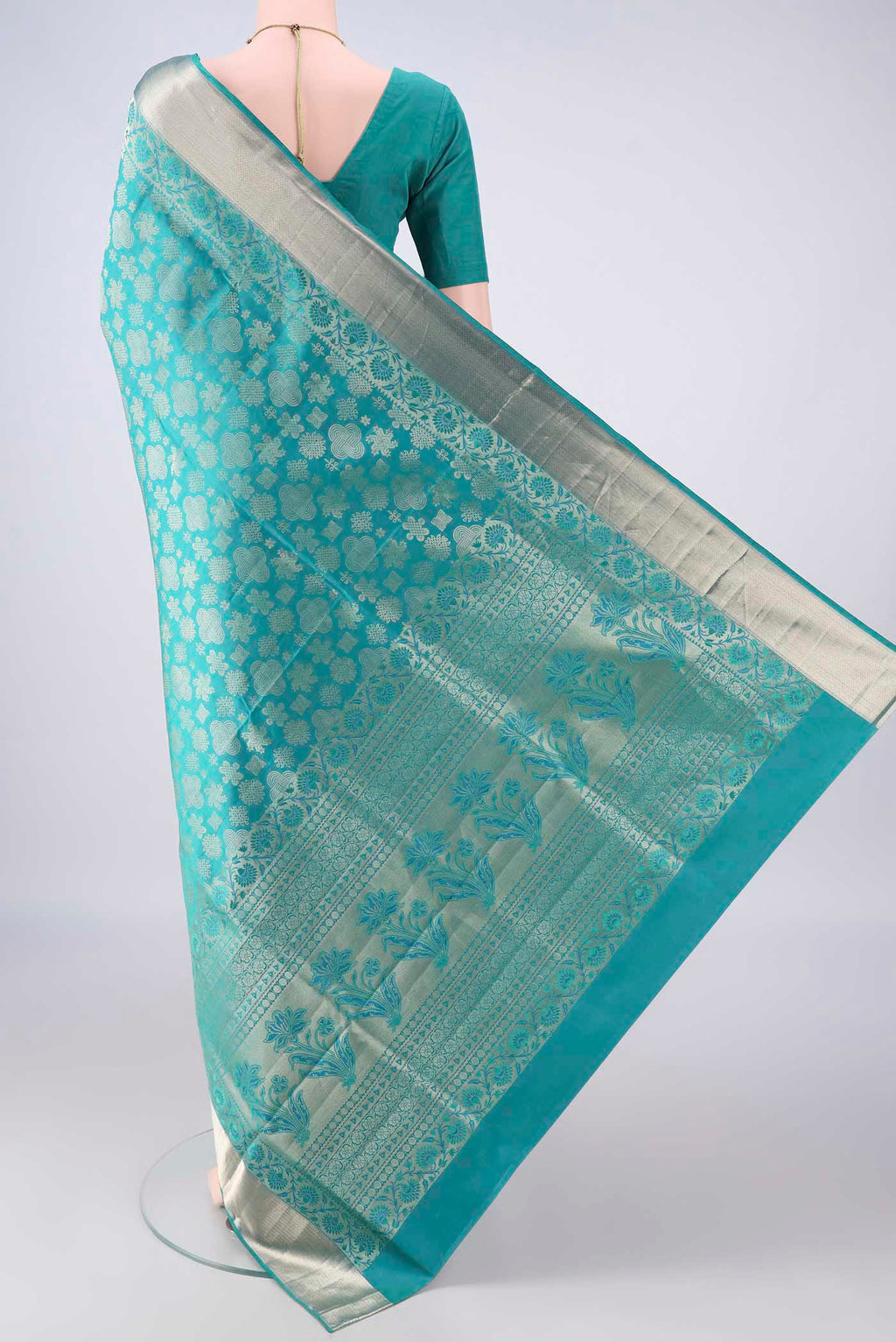 Flat view of Pure Silk Sea Green Soft Saree with Zari Brocade on the body and Zari Border. 