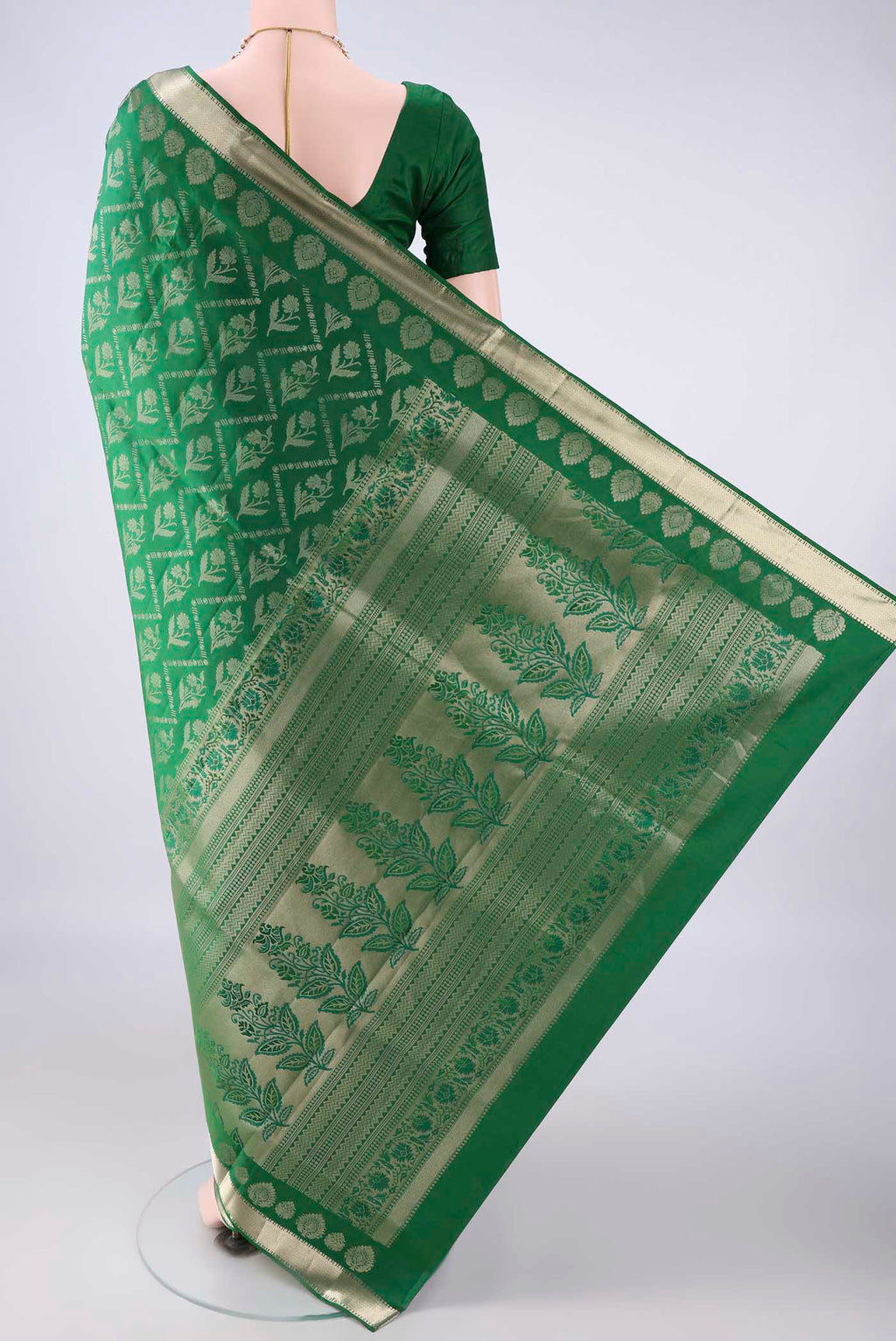 Flat view of Pure Silk Green Soft Saree with Zari Brocade on the body and Zari Border. 