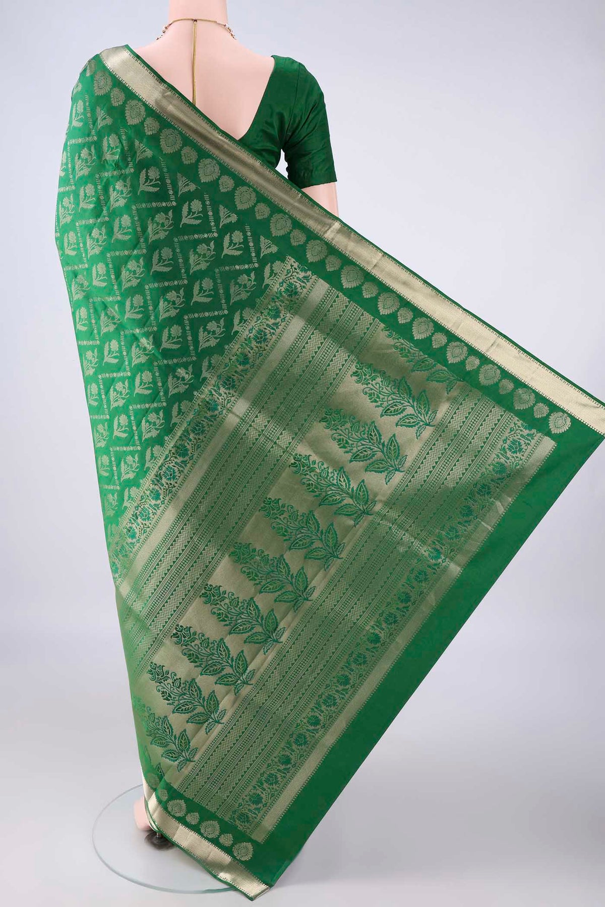 Flat view of Pure Silk Green Soft Saree with Zari Brocade on the body and Zari Border. 