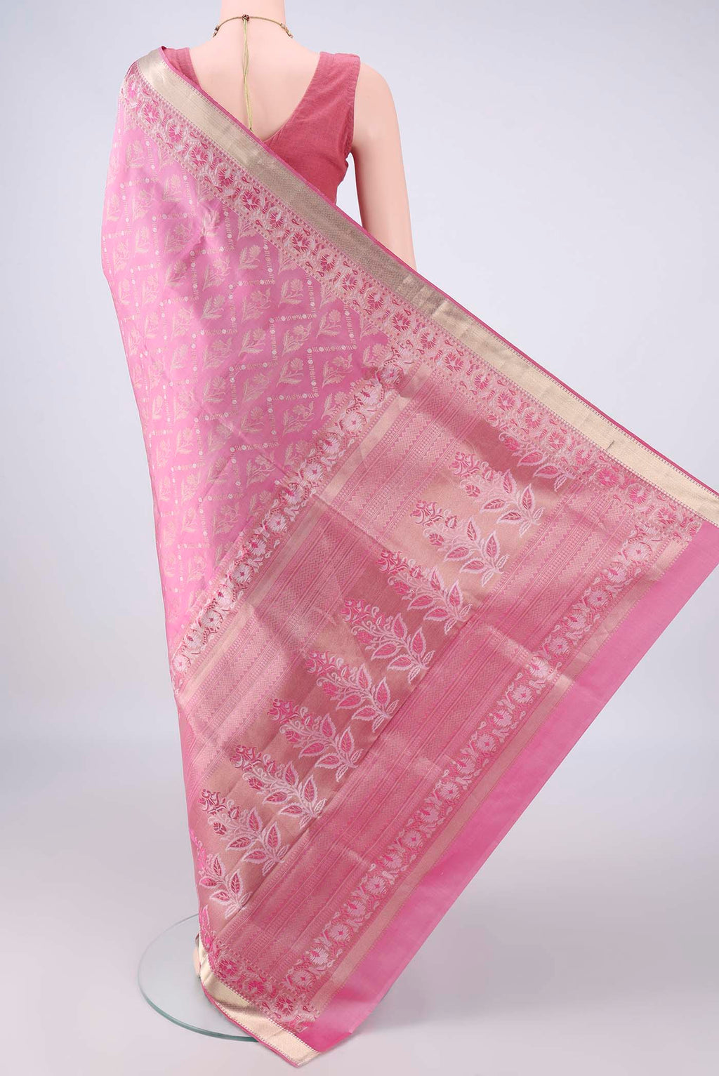 Flat view of Pure Silk Rose pink Soft Saree with Zari Brocade on the body and Zari Border. 