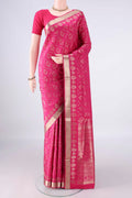 Pure Silk Rani Pink Soft Saree with Zari Brocade on the body and Zari Border.  displayed on a mannequin