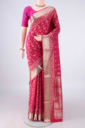 Pure Silk Rani Pink Soft Saree with Zari Butta on the body and Zari Border.  displayed on a mannequin