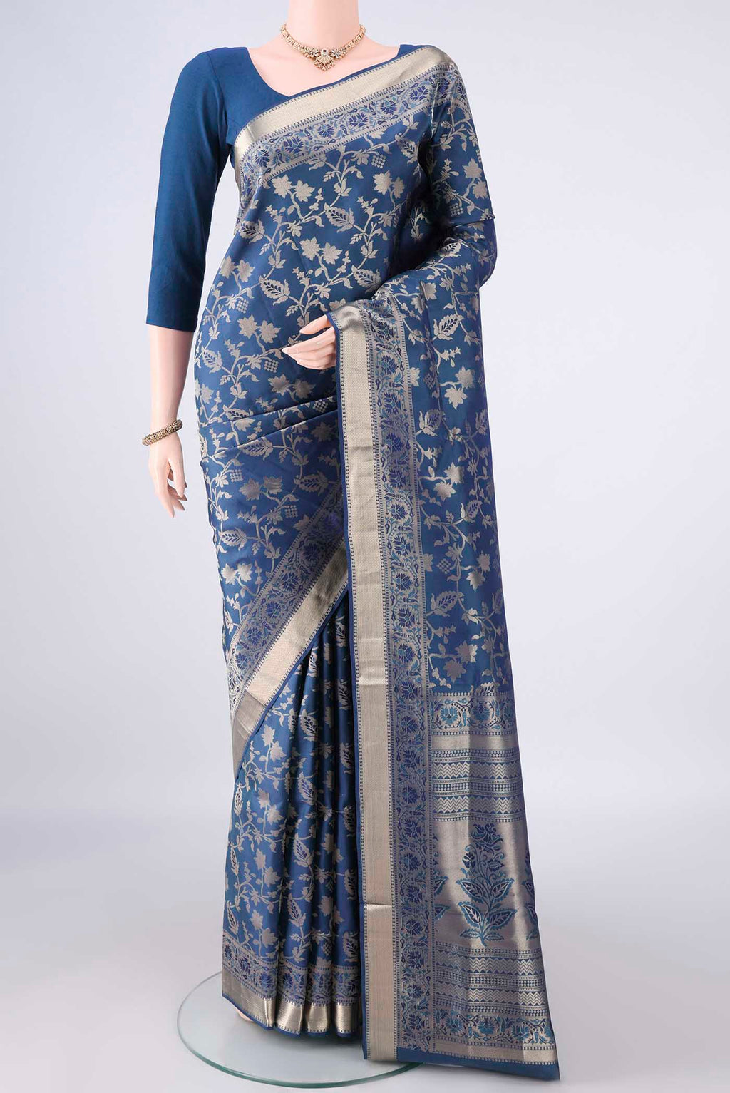Pure Silk Maya Blue Soft Saree with Zari Brocade on the body and Zari Border.  displayed on a mannequin