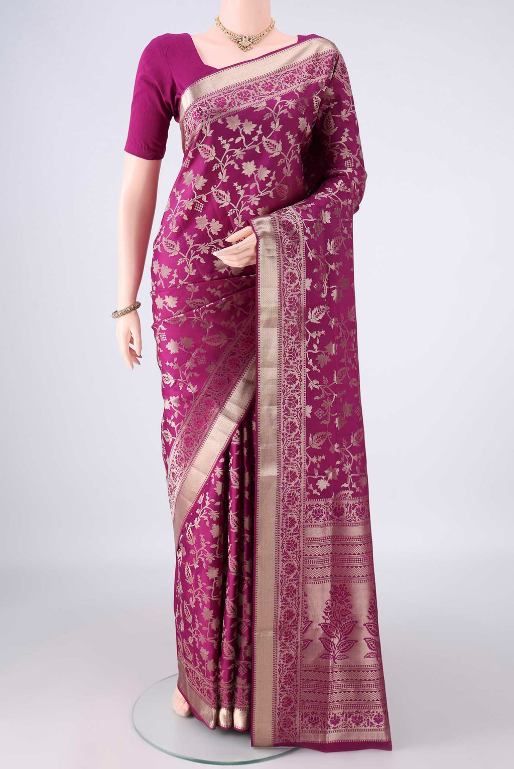 Pure Silk Magenta Soft Saree with Zari Brocade on the body and Zari Border.  displayed on a mannequin