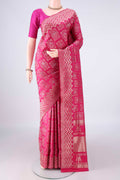 Pure Silk Rani Pink Soft Saree with Zari Brocade on the body and Zari Border.  displayed on a mannequin