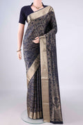 Pure Silk Navy Blue Soft Saree with Zari Brocade on the body and Zari Border.  displayed on a mannequin