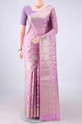 Pure Silk Lavender Banarasi Raw Saree with Zari Butta on the body and Zari Border.  displayed on a mannequin