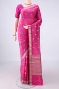 Pure Silk Rani Pink Banarasi Raw Saree with Zari Butta on the body and Zari Border.  displayed on a mannequin