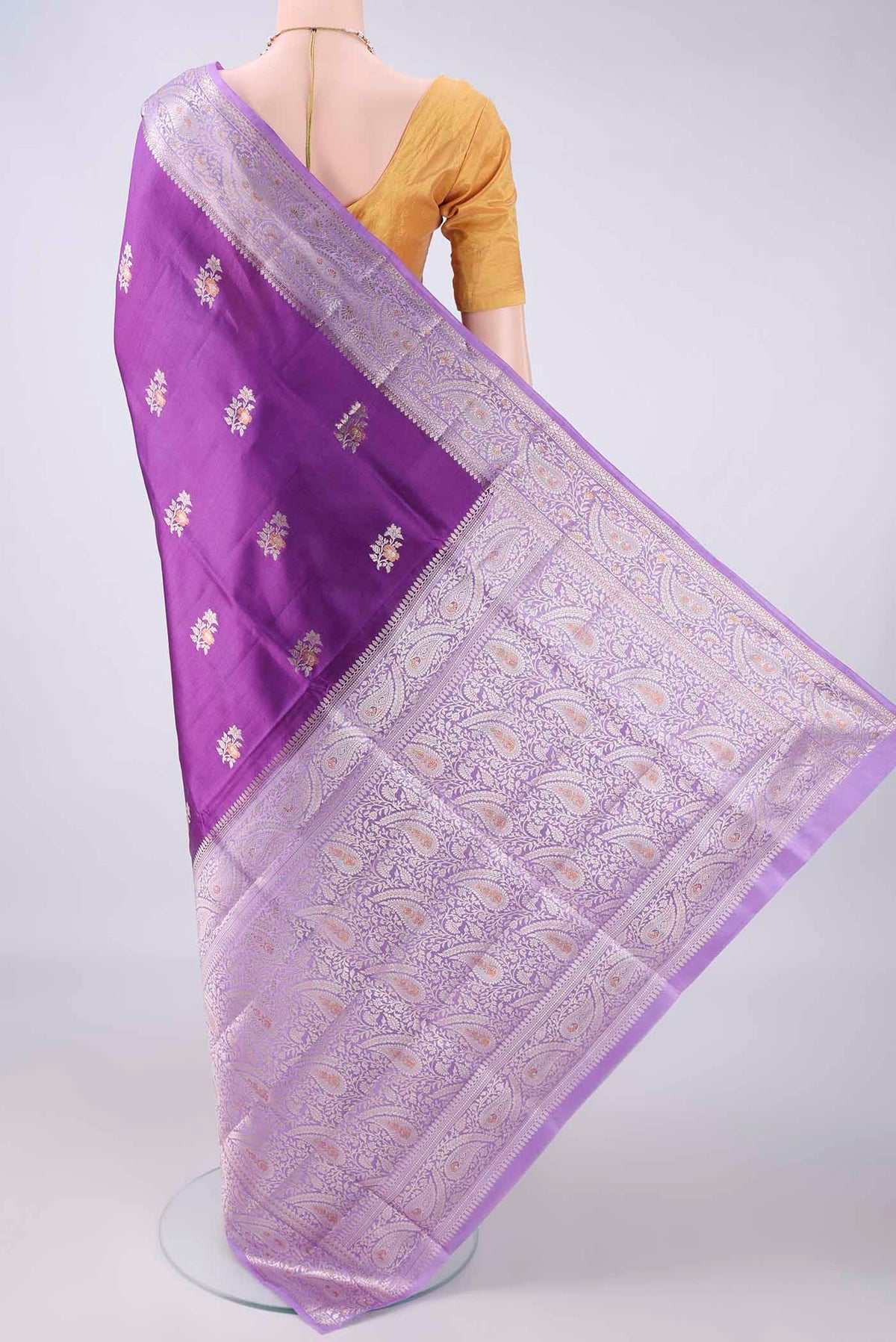 Flat view of Pure Silk Purple Banarasi Raw Saree with Zari Brocade on the body and Zari Border. 