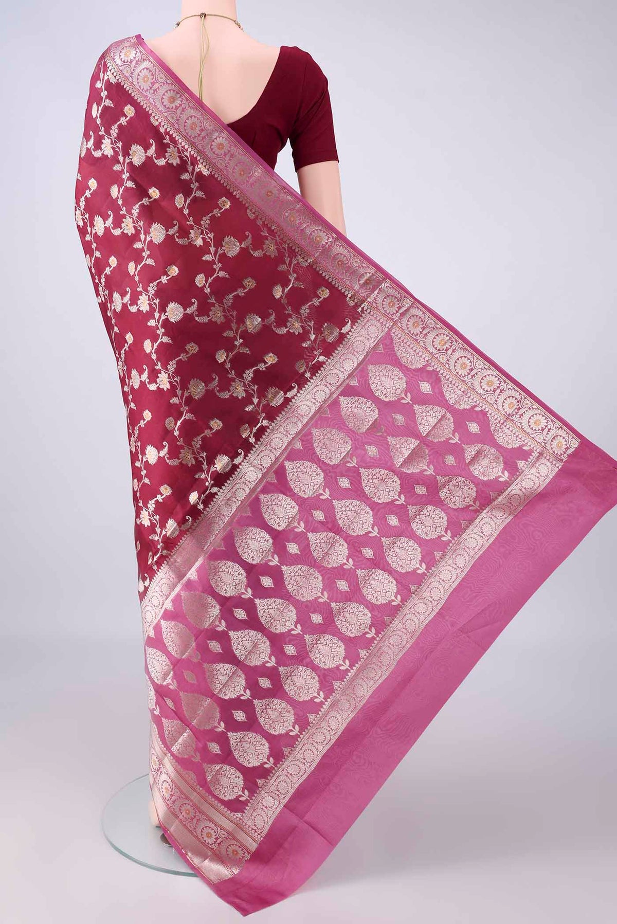 Flat view of Pure Silk Maroon Banarasi Raw Saree with Zari Brocade on the body and Zari Border. 