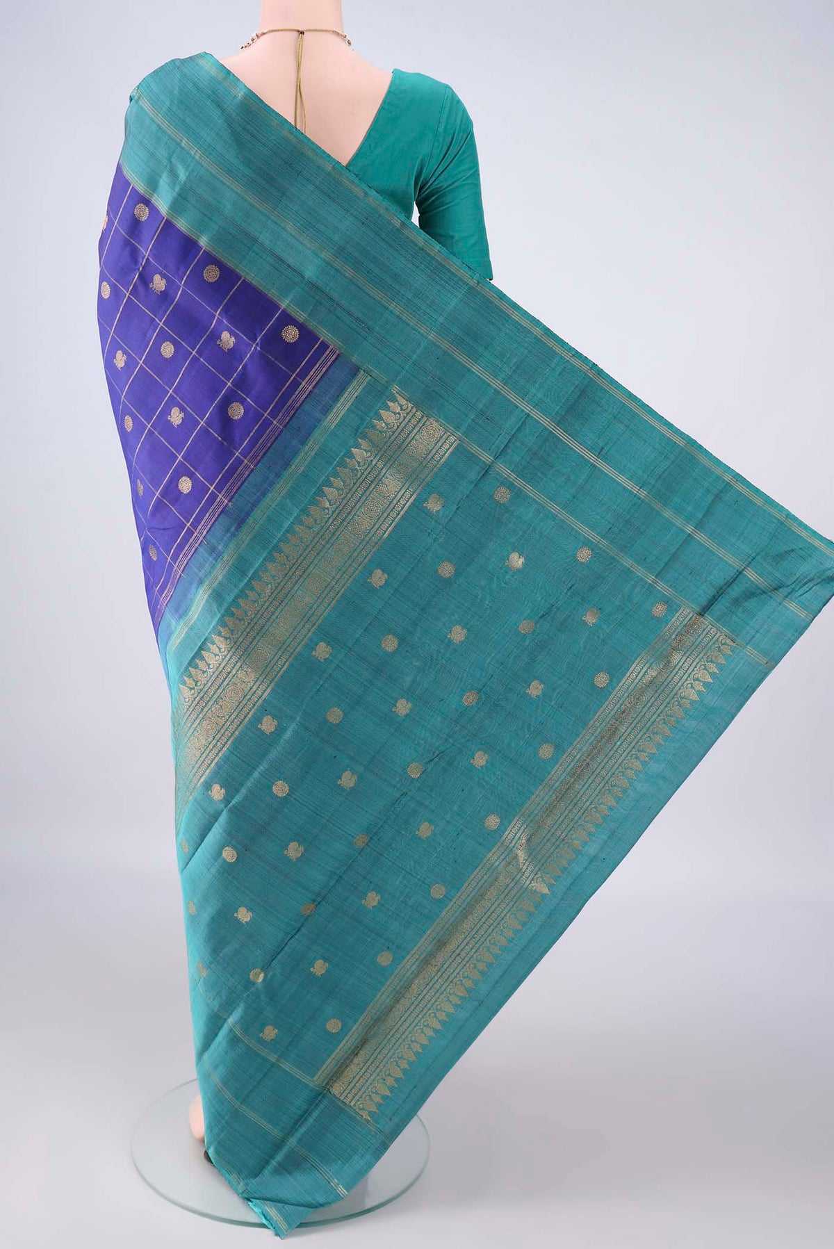 Flat view of Pure Silk Royal Blue Kanjivaram Saree with Checked design on the body and Zari Border. 