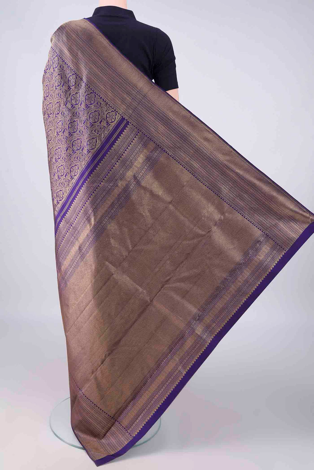Flat view of Pure Silk Navy Blue Kanchipuram Saree with Zari Brocade on the body and Zari Border. 