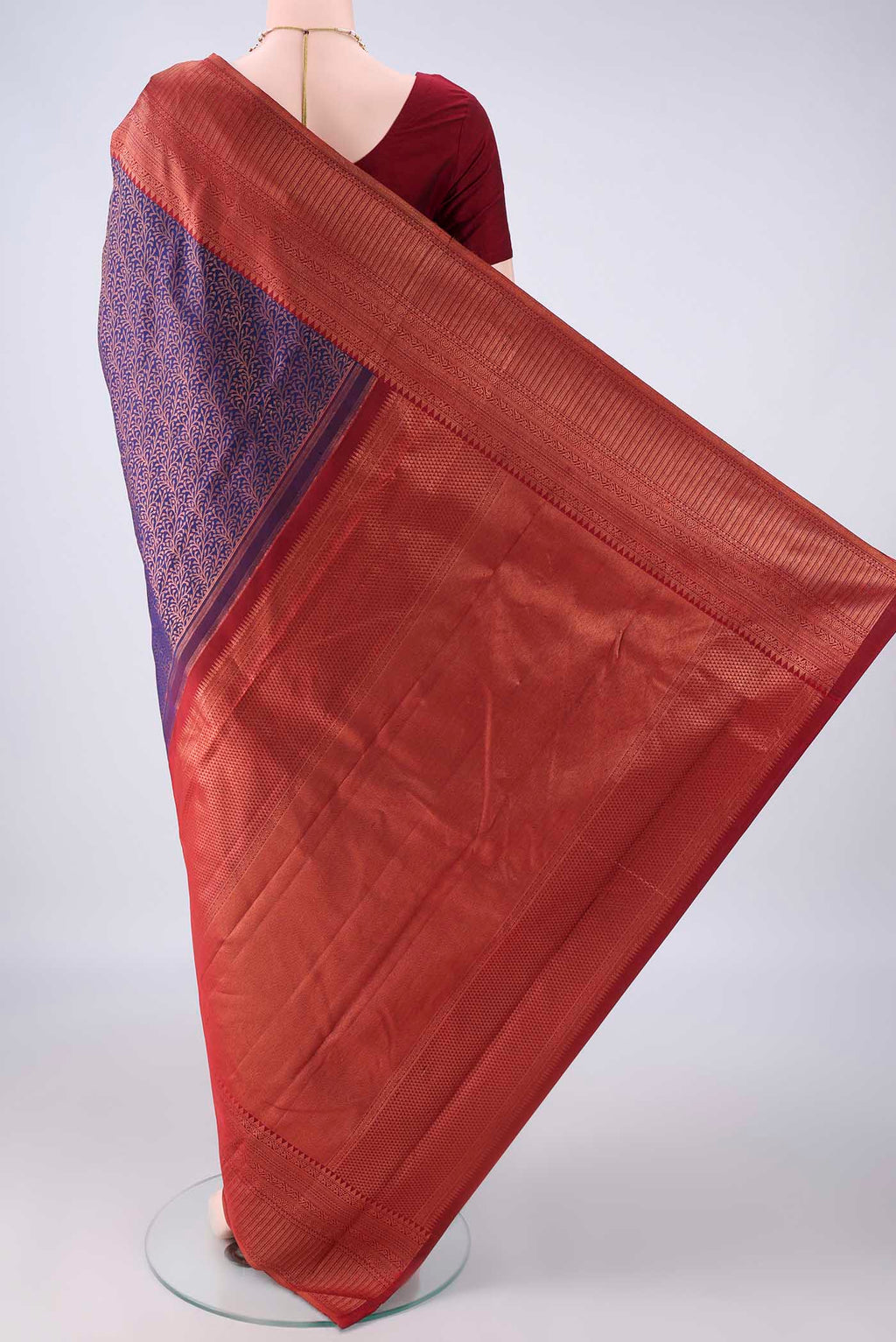 Flat view of Pure Silk Navy Blue Kanchipuram Saree with Zari Brocade on the body and Zari Border. 