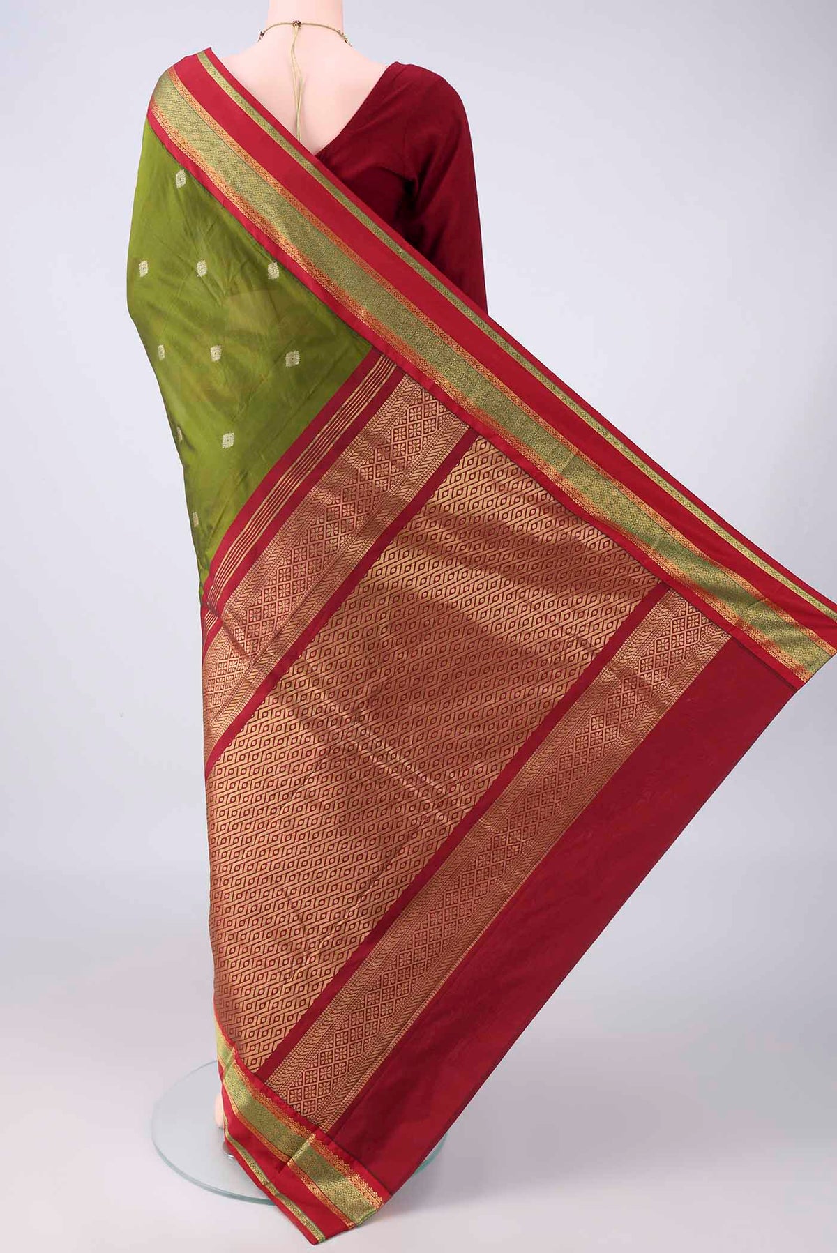 Flat view of Mehandi Green Blended Bangalore Silk Saree with Zari Butta on the body and Zari Border. 