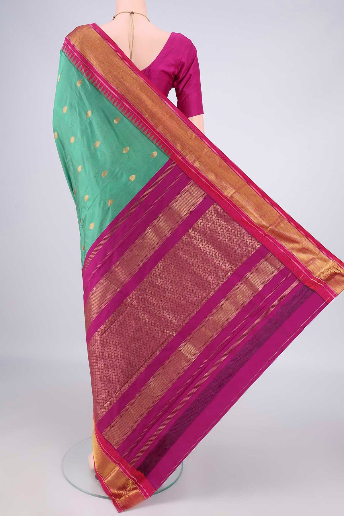Flat view of Light Green Blended Bangalore Silk Saree with Zari Butta on the body and Zari Border. 