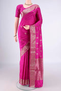 Pure Silk Rani Pink Banarasi Katan Saree with Zari Butta on the body and Zari Border.  displayed on a mannequin