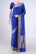 Pure Silk Royal Blue Banarasi Katan Saree with Zari Butta on the body and Zari Border.  displayed on a mannequin
