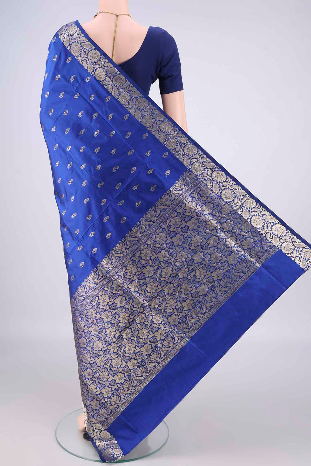 Flat view of Pure Silk Royal Blue Banarasi Katan Saree with Zari Butta on the body and Zari Border. 