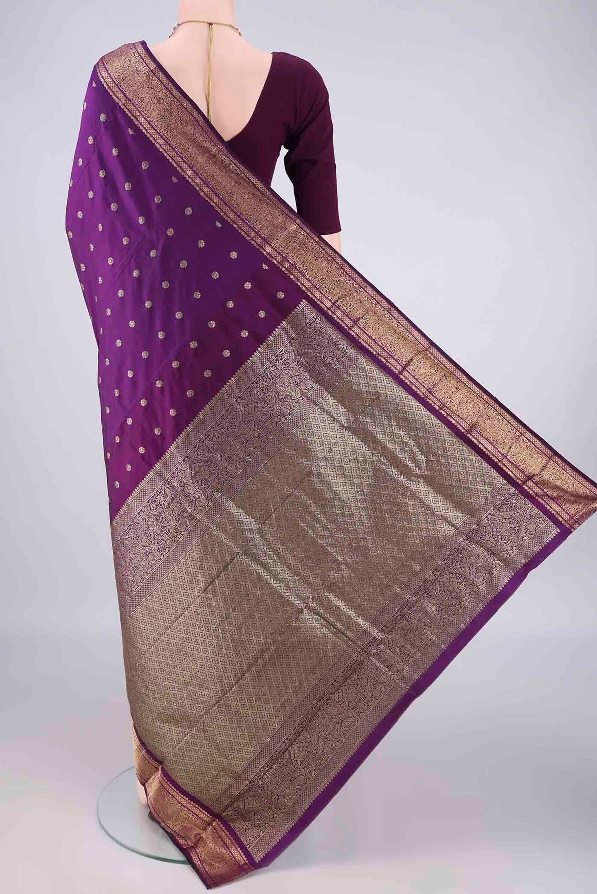 Flat view of Purple Blended Bangalore Silk Saree with Zari Butta on the body and Zari Border. 