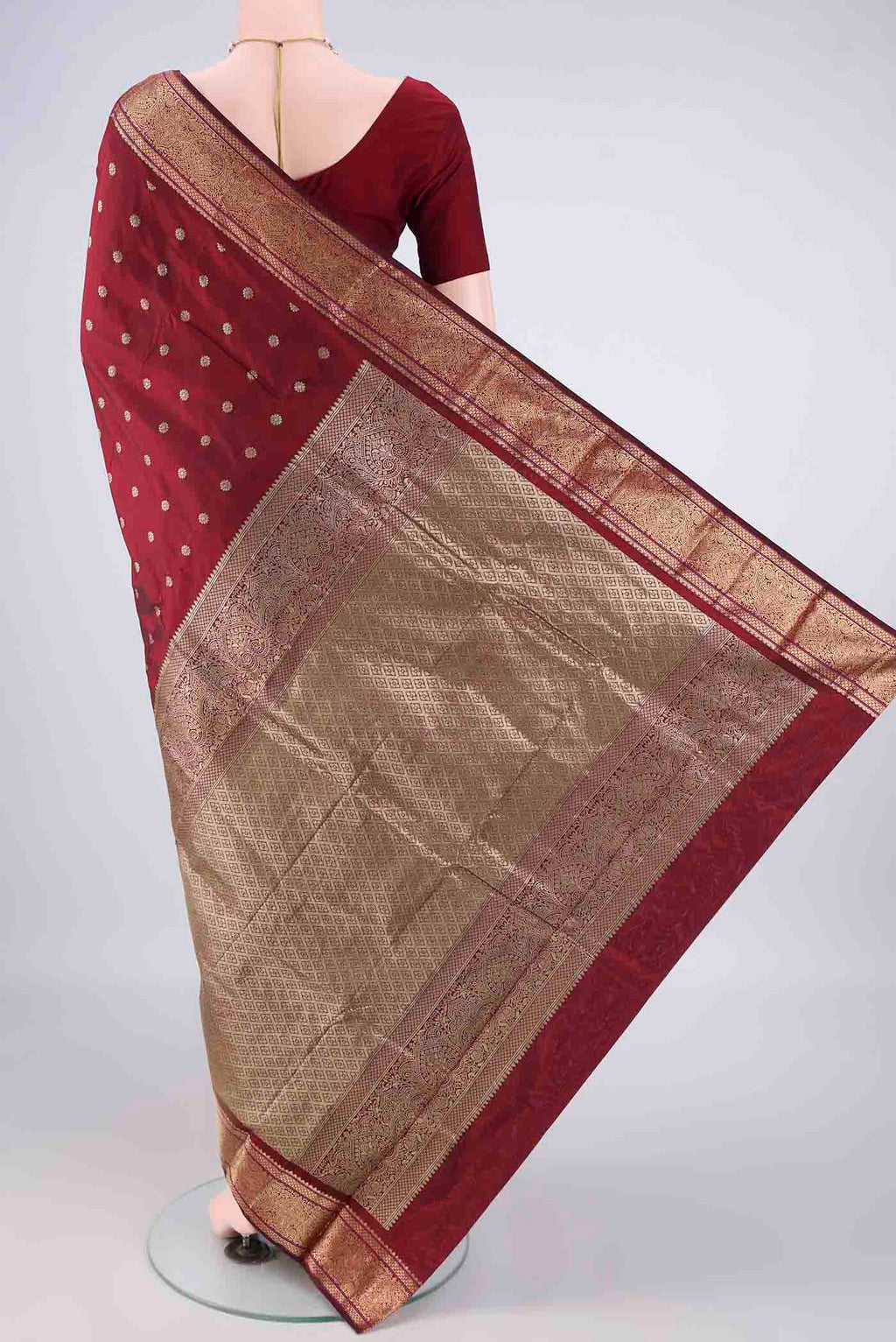 Flat view of Maroon Blended Bangalore Silk Saree with Zari Butta on the body and Zari Border. 