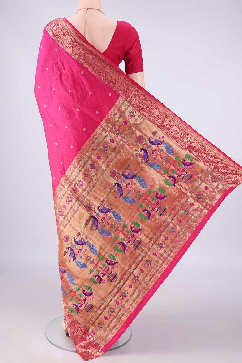 Flat view of Rani Pink Blended Paithani Silk Saree with Jacquard design on the body and Zari Border. 