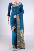 Blue Blended Paithani Silk Saree with Jacquard With Zari Butta on the body and Zari Border.  displayed on a mannequin
