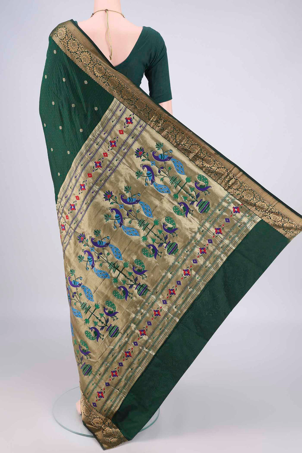 Flat view of Bottle Green Blended Paithani Silk Saree with Jacquard With Zari Butta on the body and Zari Border. 