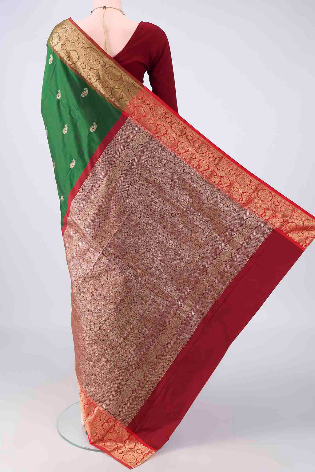 Flat view of Green Blended Bangalore Silk Saree with Zari Butta on the body and Zari Border. 