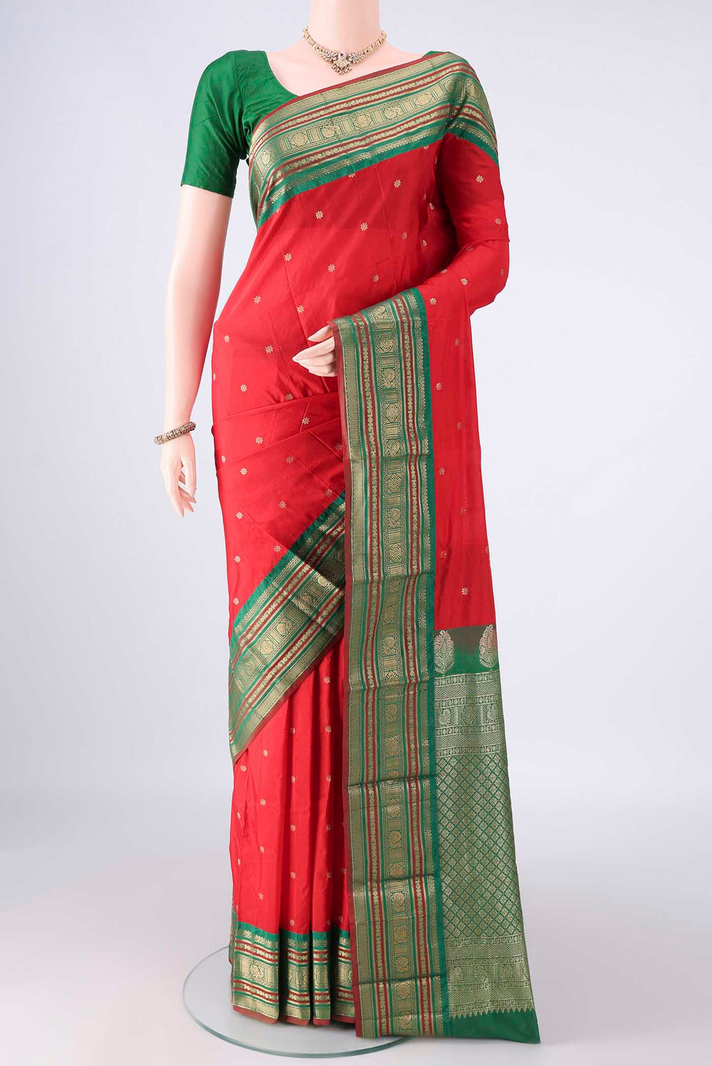 Red Blended Bangalore Silk Saree with Zari Butta on the body and Zari Border.  displayed on a mannequin