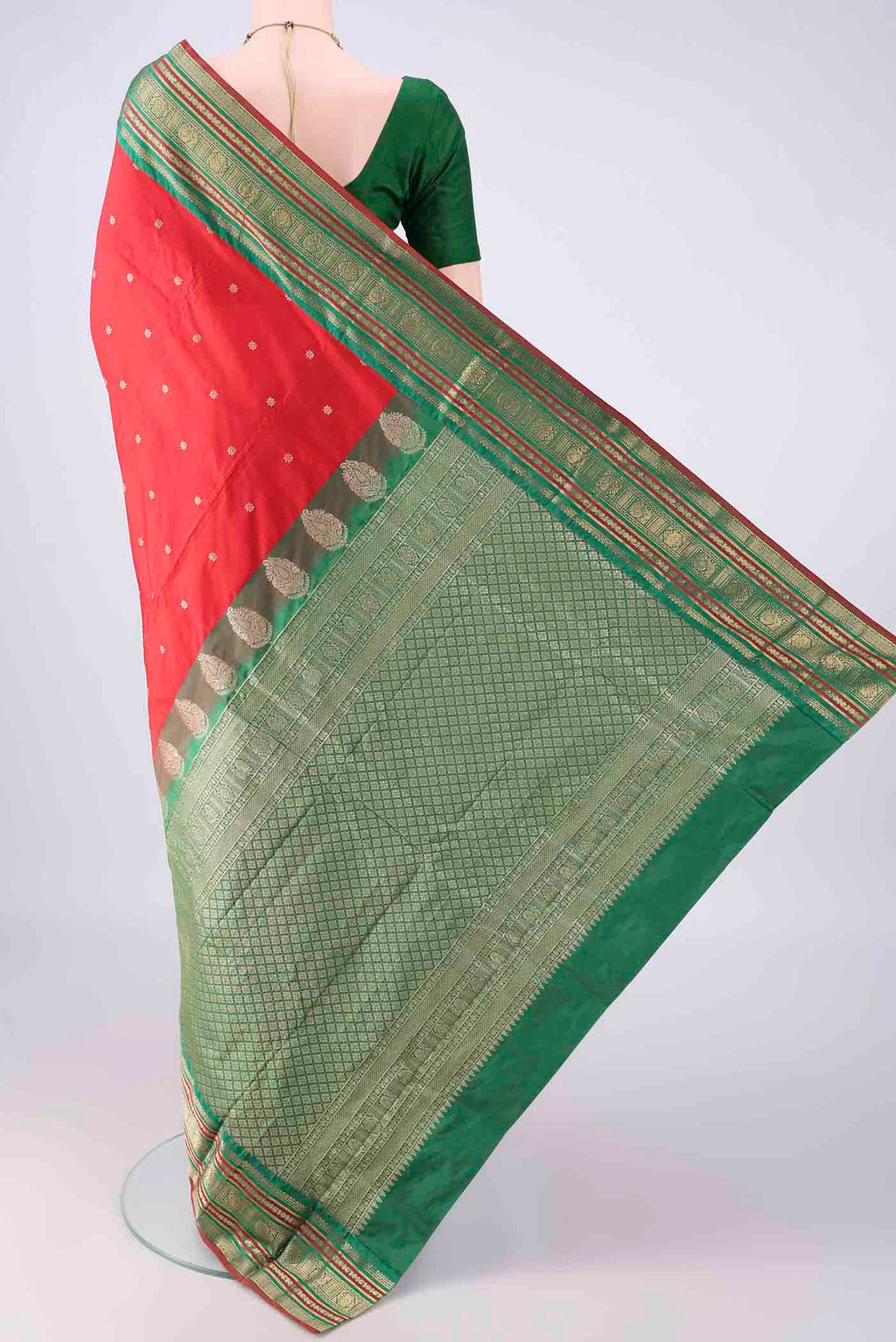 Flat view of Red Blended Bangalore Silk Saree with Zari Butta on the body and Zari Border. 
