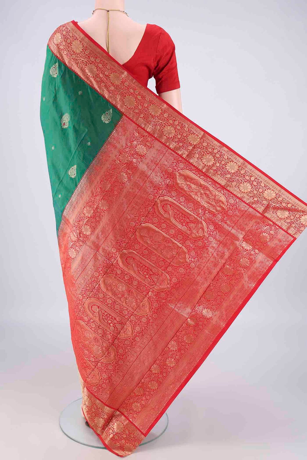 Flat view of Green Blended Bangalore Silk Saree with Zari Butta on the body and Zari Border. 