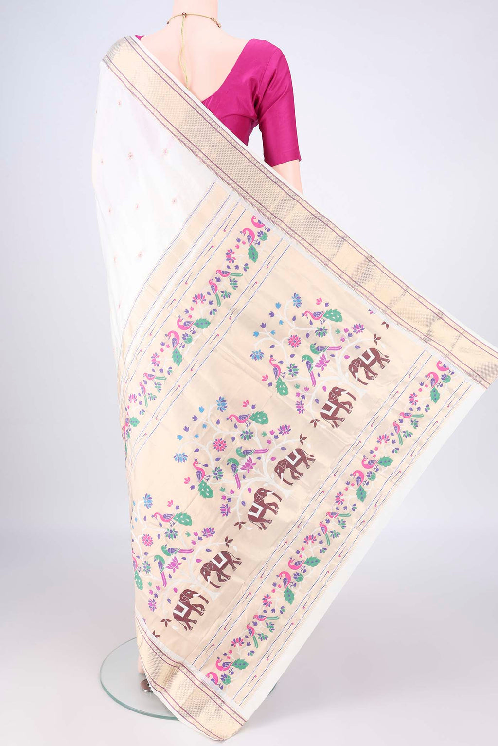 Flat view of White Blended Paithani Silk Saree with Zari And Thread Butta on the body and Zari Border. 