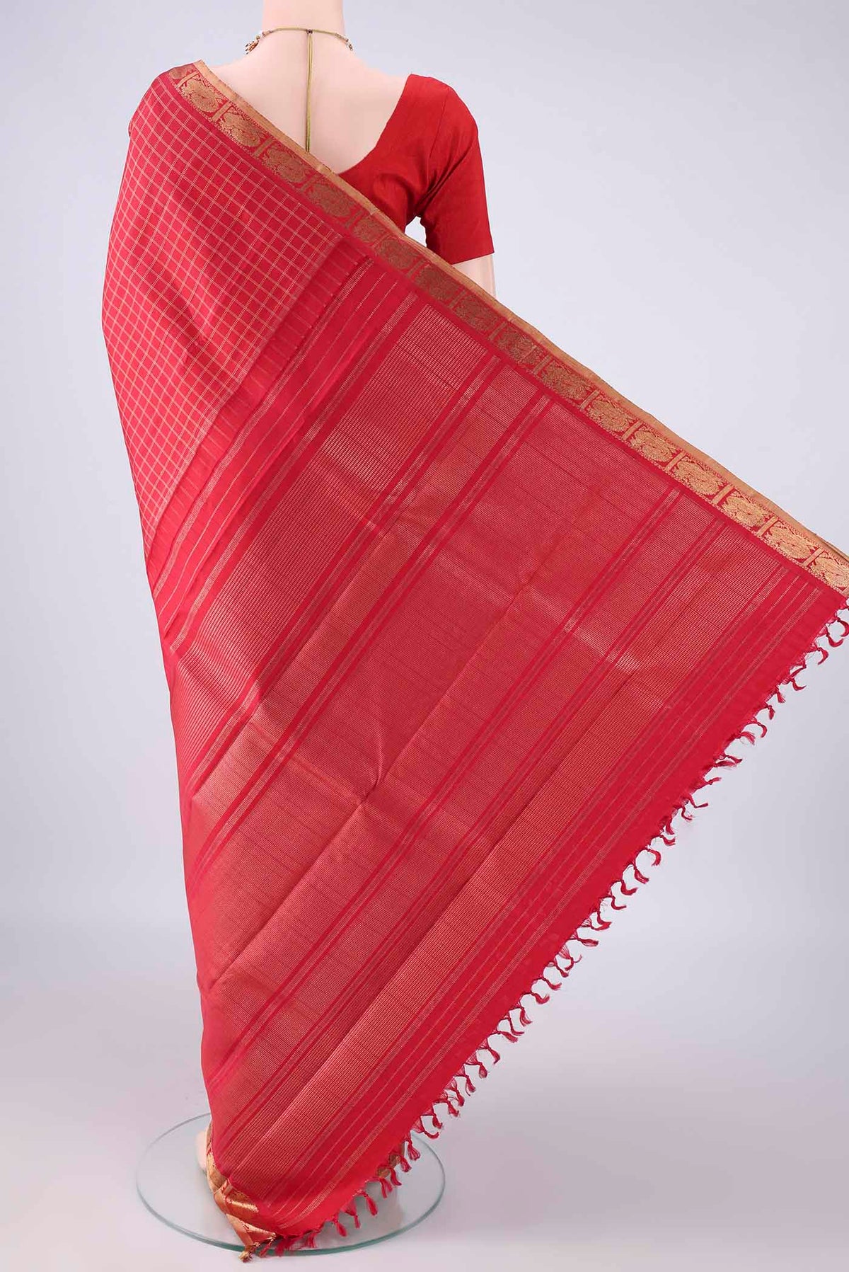 Flat view of Pure Silk Pure Zari Red Kanchipuram Saree with Checked design on the body and Zari Border. 