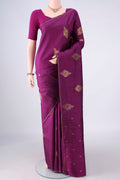 Pure Silk Pure Zari Magenta Kanchipuram Saree with Zari Butta on the body and Thin Zari Line.  displayed on a mannequin