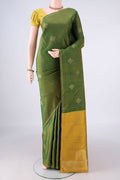 Pure Silk Pure Zari Mehandi Green Kanchipuram Saree with Zari Butta on the body and Plain Border.  displayed on a mannequin