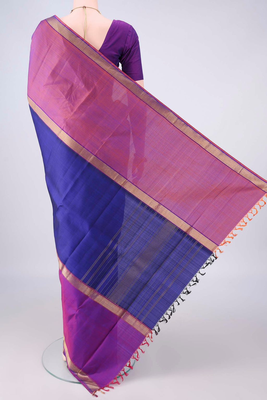 Flat view of Pure Silk Royal Blue Kanchipuram Saree with Plain Body and Zari Border. 