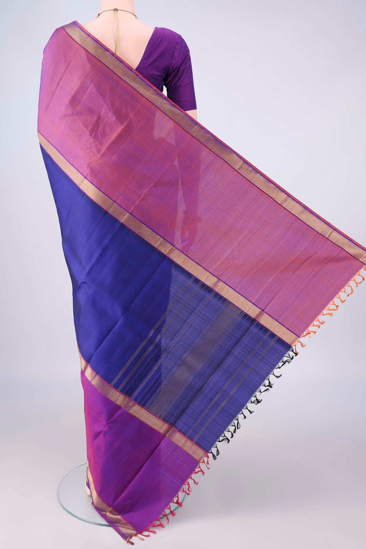 Flat view of Pure Silk Royal Blue Kanchipuram Saree with Plain Body and Zari Border. 