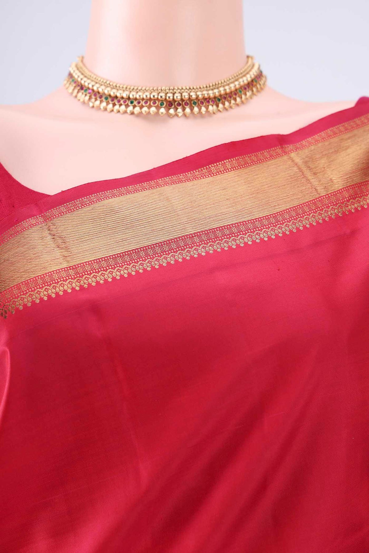 Border image of Pure Silk Pure Zari Red Kanjivaram Saree with Plain Body and Zari Border. 