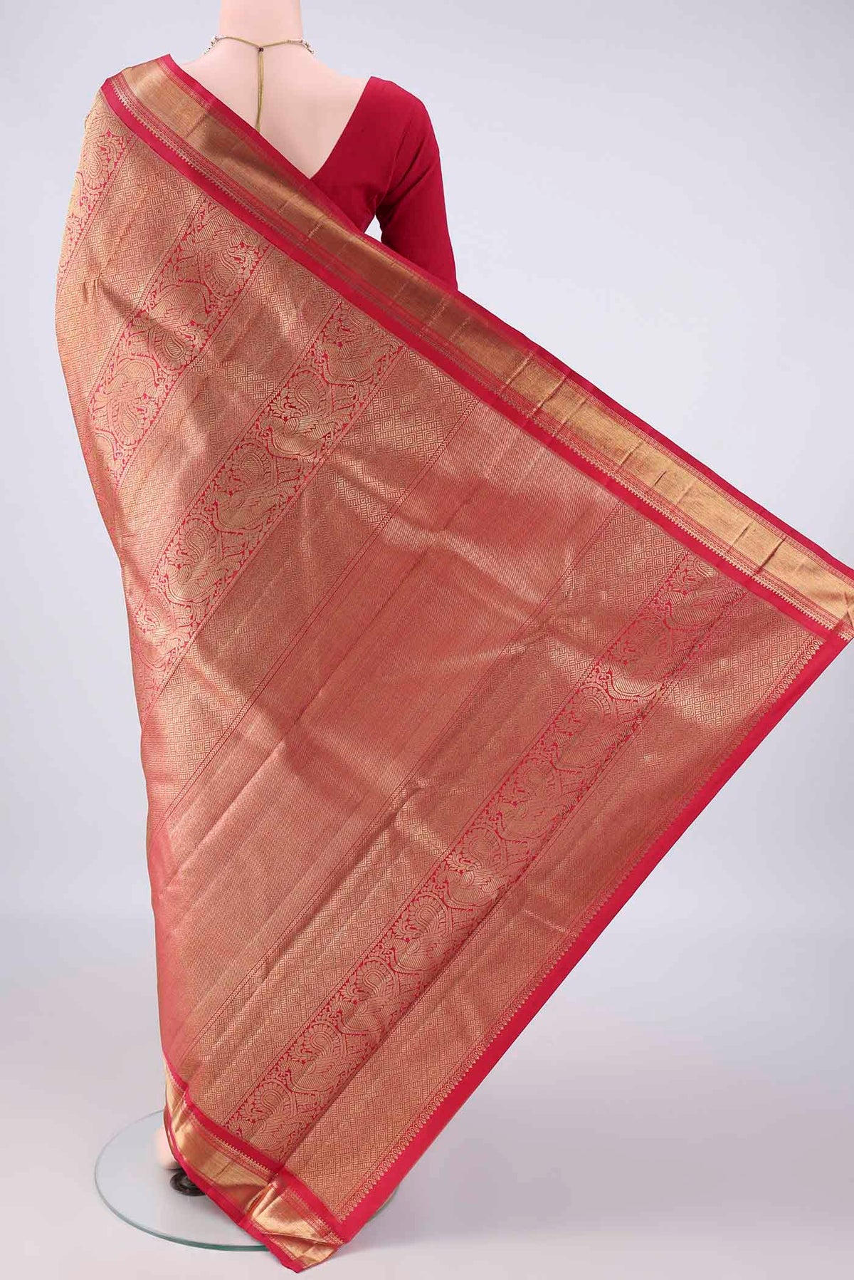 Flat view of Pure Silk Pure Zari Red Kanjivaram Saree with Plain Body and Zari Border. 