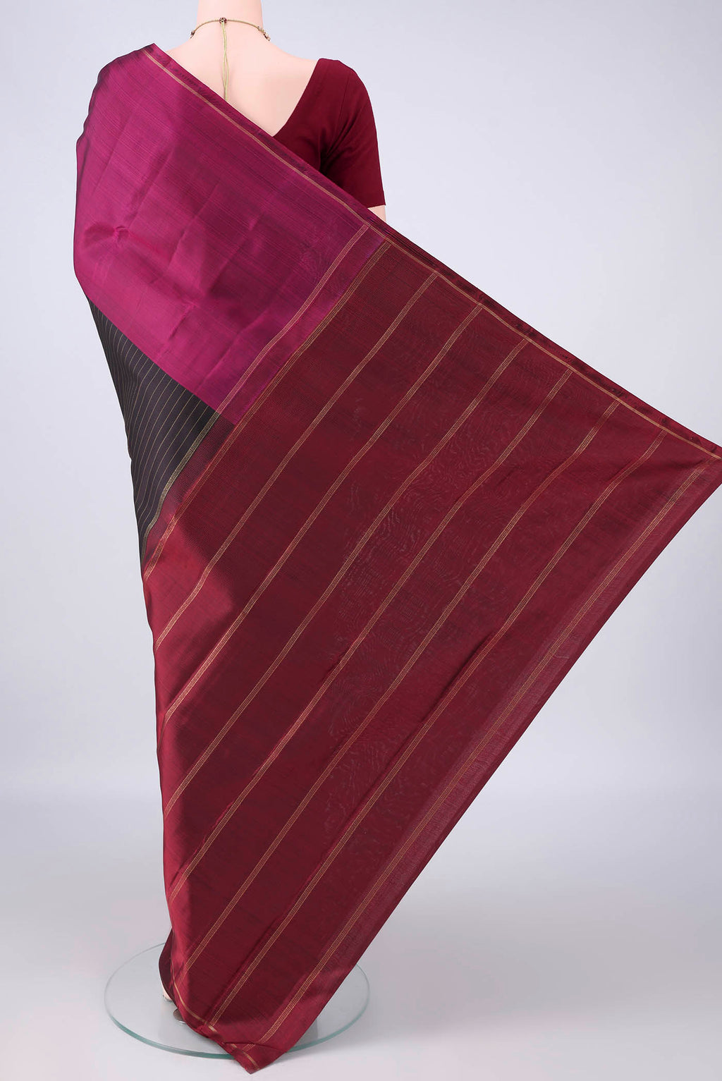Flat view of Pure Silk Black Kanjivaram Saree with Stripes on the body and Ganga Jamuna Border. 