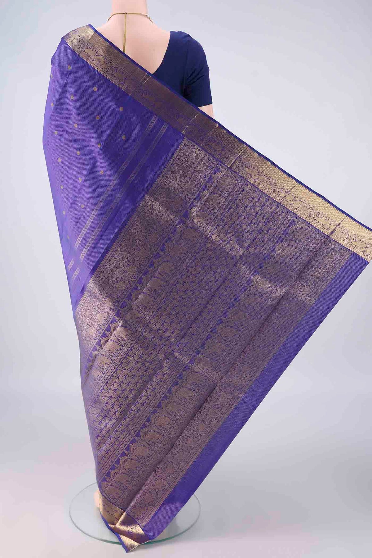 Flat view of Pure Silk Pure Zari Royal Blue Kanjivaram Saree with Zari Butta on the body and Zari Border. 