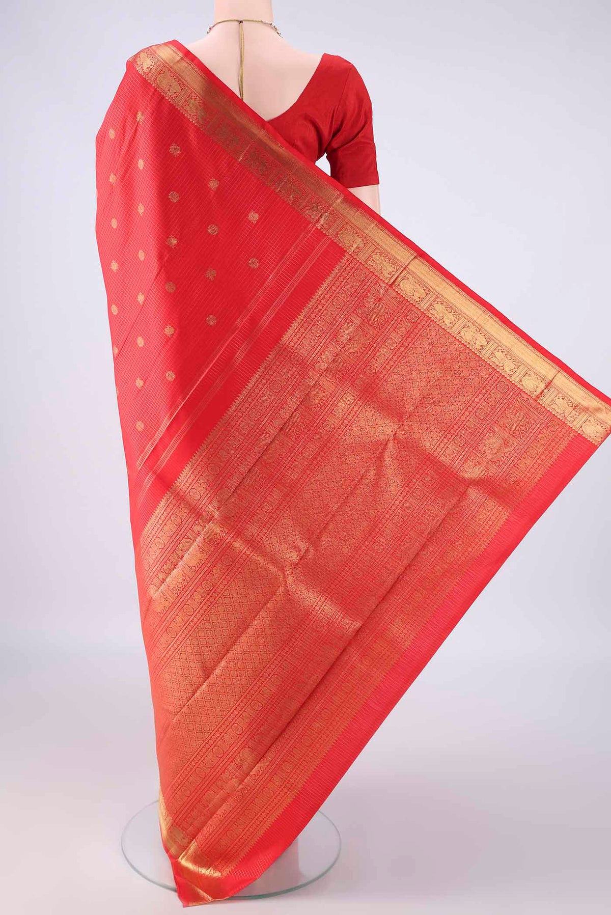 Flat view of Pure Silk Pure Zari Red Kanjivaram Saree with Checked design on the body and Zari Border. 