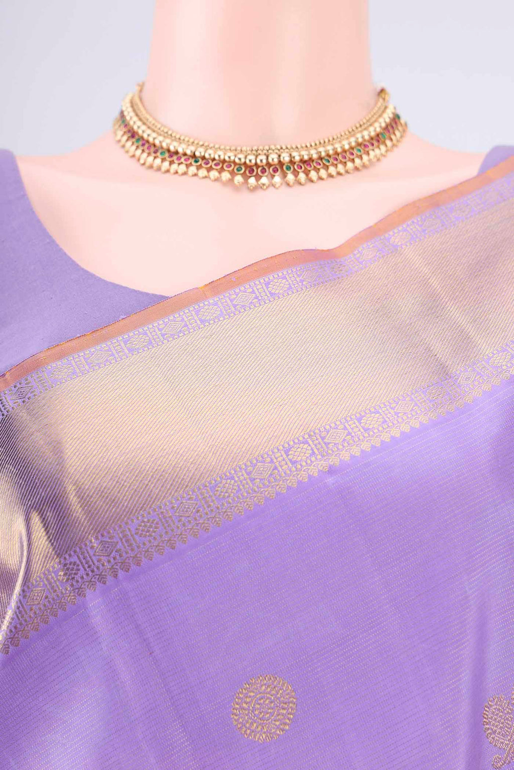 Border image of Pure Silk Pure Zari Lavender Kanjivaram Saree with Zari Butta on the body and Zari Border. 