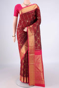 Pure Silk Maroon Kanjivaram Saree with Checked design on the body and Zari Border.  displayed on a mannequin