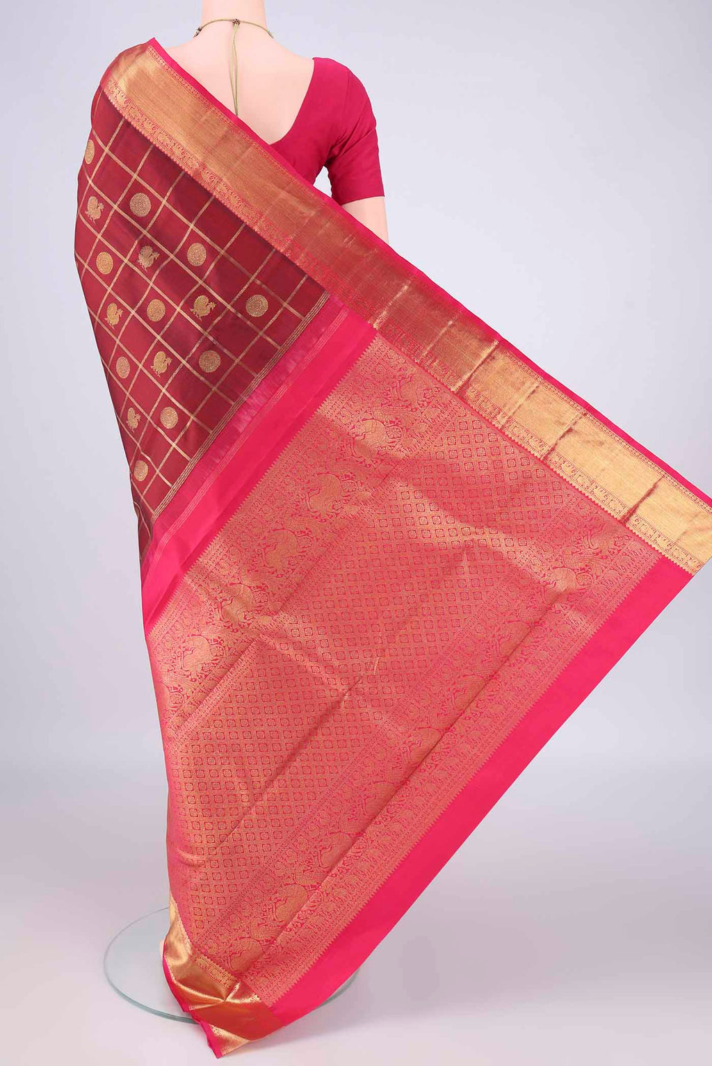 Flat view of Pure Silk Maroon Kanjivaram Saree with Checked design on the body and Zari Border. 