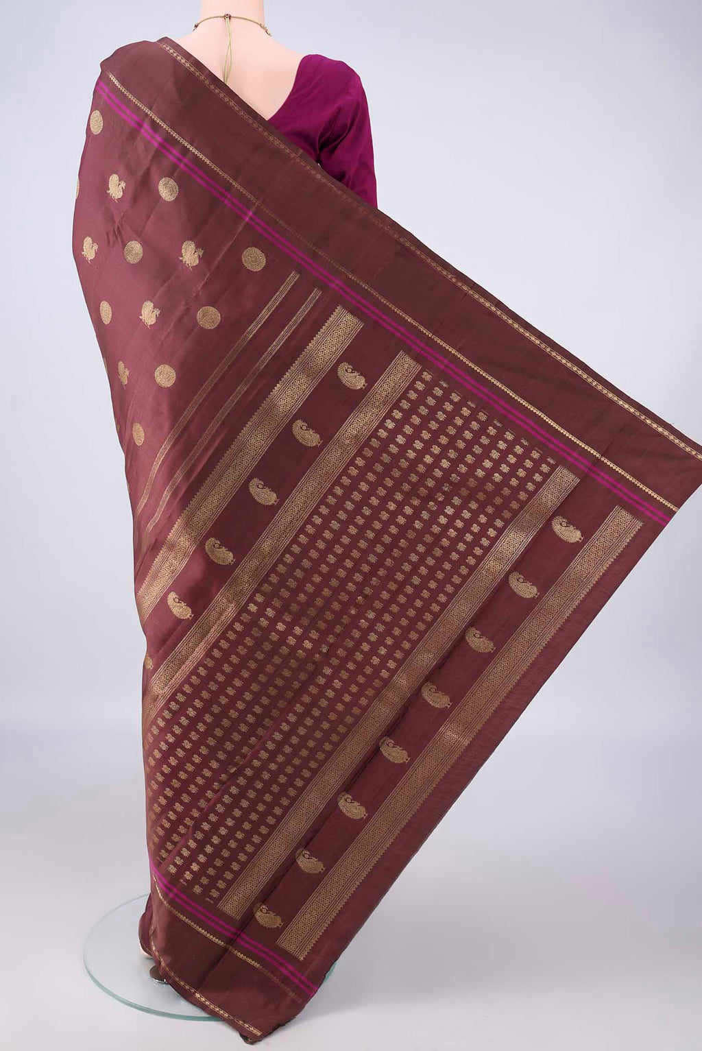 Flat view of Pure Silk Brown Kanchipuram Saree with Zari Butta on the body and Plain Border. 