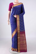 Pure Silk Pure Zari Royal Blue Kanjivaram Saree with Checked design on the body and Zari Border.  displayed on a mannequin